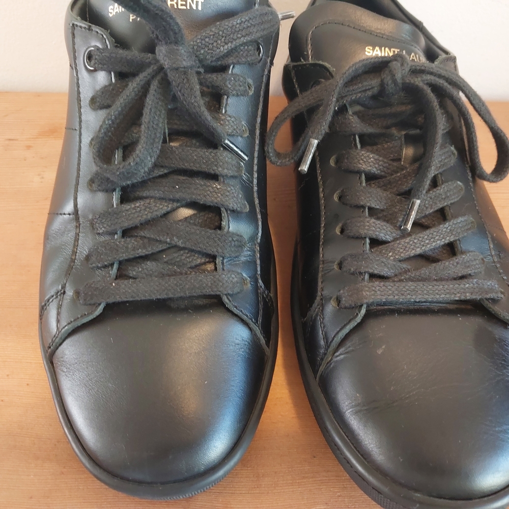 Saint Laurent Black Sneakers with Minimalist Design and Leather Material